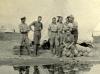 Group picture at camp near the pond, nd.