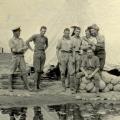 Group picture at camp near the pond, nd.