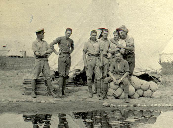 Group picture at camp near the pond, nd.