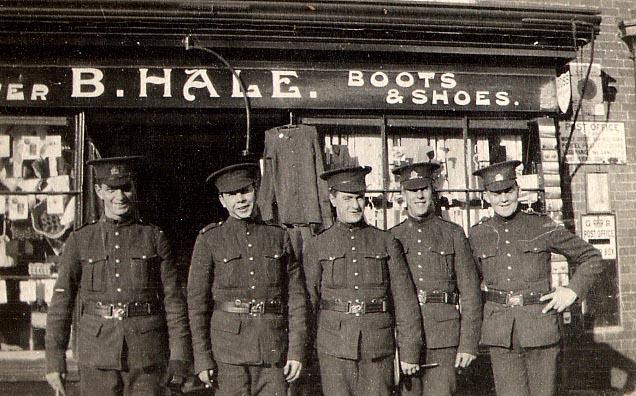 Photo #18
Posing for Photo
In front of "Hale's 
Boots &amp; Shoe" Store